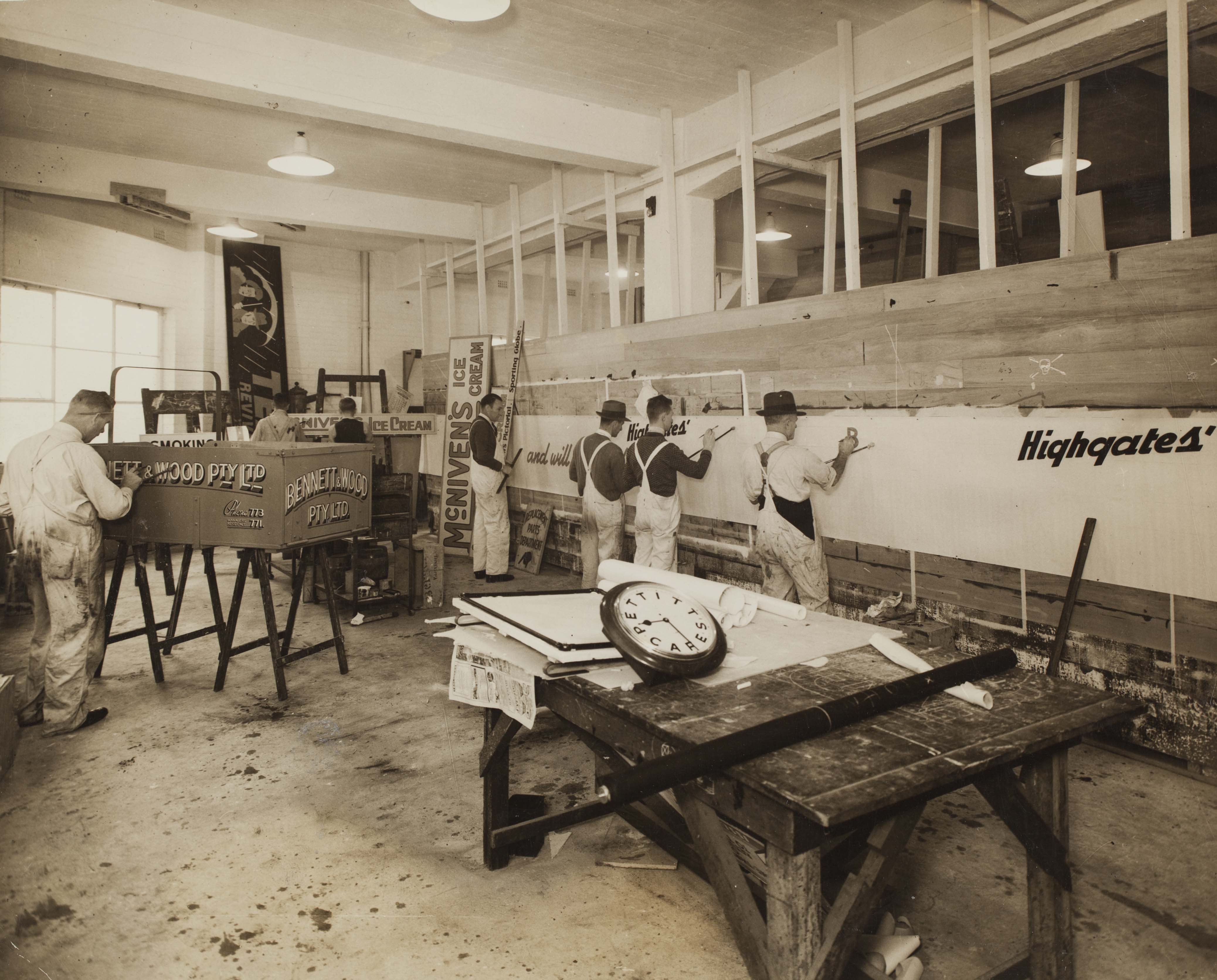 Men painting studio walls