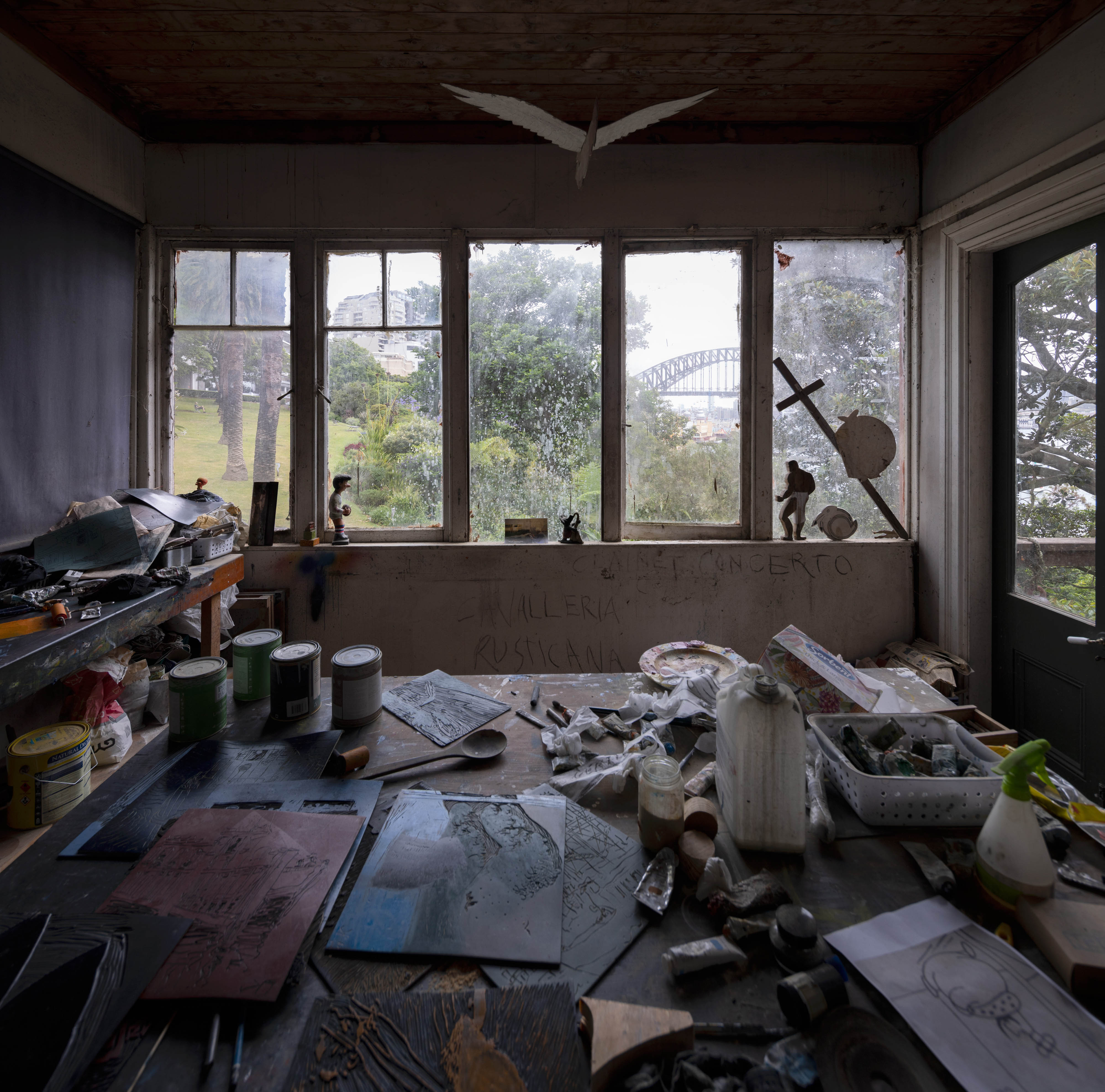 Interior of studio room. View of the Harbour Bridge out of the window.