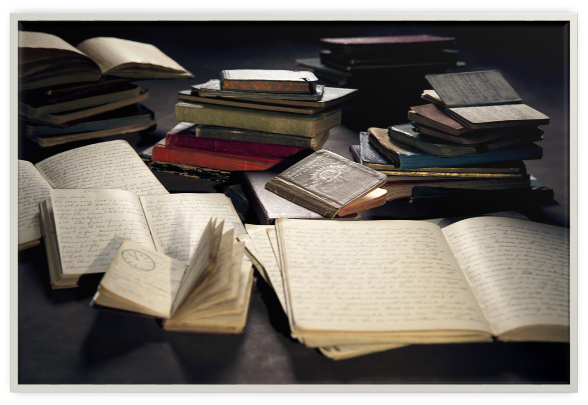 Photograph of leather bound journals and diaries