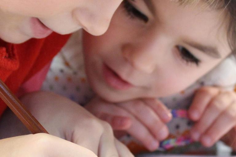 Two children drawing