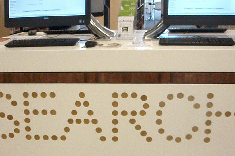 library service desk with public access computers - Bankstown Library