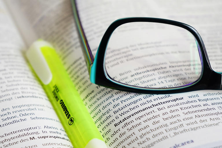 reading glasses on a book