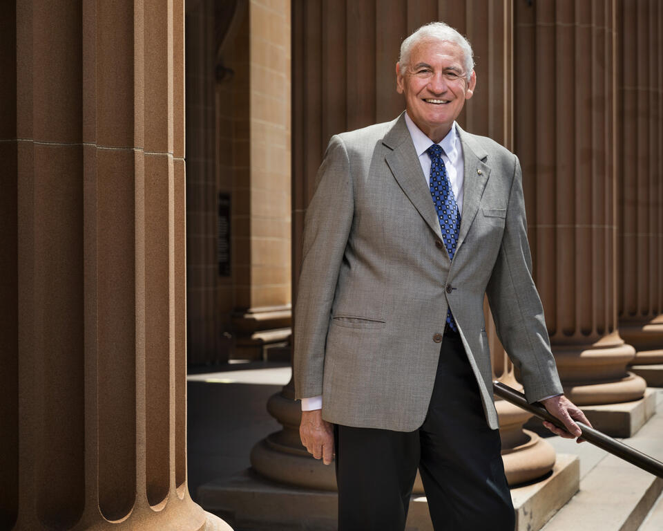 The Hon George Souris AM on the steps of the historic Mitchell building.