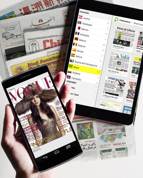 View of magazines on phone and tablet